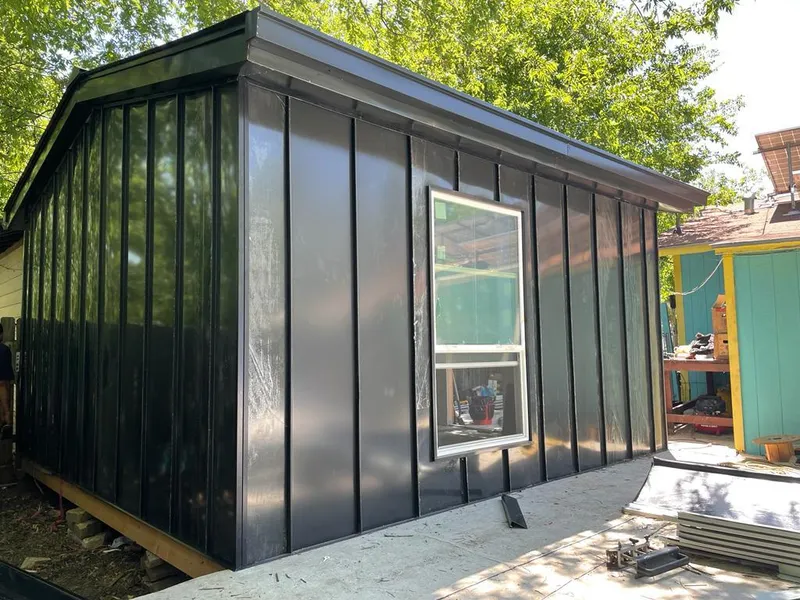 Black standing seam metal wall panels for Metal Roof Installation in Romulus