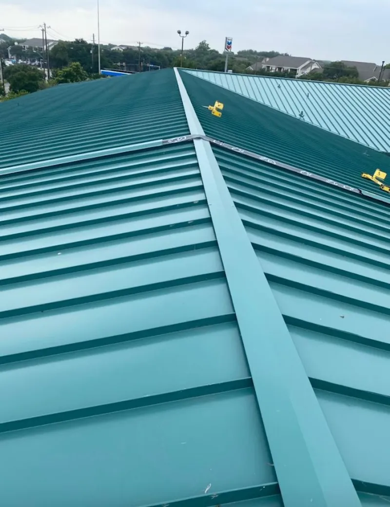 Green commercial metal roof ridge and valley for Metal Roof Repair in Romulus